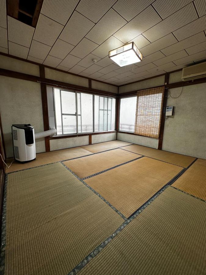 素泊まり民宿とみや Oshima Exterior foto